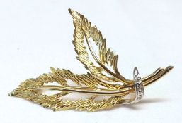 A hallmarked 9ct Gold Twin Pierced Leaf Design Brooch with small Diamonds mount and weighing