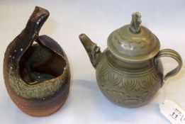 A 20th Century Celadon Lidded Ewer of teapot form; together with a further small earthenware fruit-