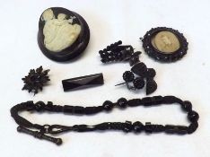 A Mixed Lot comprising: a Victorian Jet Brooch with raised Cameo of mother and child centre;