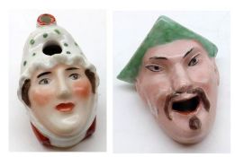 An unusual novelty Pen Stand modelled as the head of a Chinese man wearing a green peaked cap,