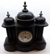 A late 19th/early 20th Century Black Marble Colonnade style Mantel Clock with domed top, applied