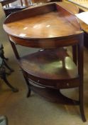 A 19th Century Mahogany Corner Wash Stand of typical form, the three shelves fitted with central