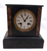 A small Victorian Black Marble Mantel Clock with veined marble decoration panels, the circular
