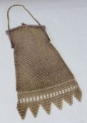 An early 20th Century Silver Plated Meshwork Evening Purse with chain handle, stamped “Alpacca”,