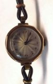 A Ladies Vintage 9ct Gold Cased Wristwatch with silvered dial, octagonal bezel, leather strap,