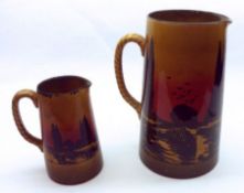 Two Royal Doulton Poplars at Sunset Jugs with rope-effect handles, the largest 11” high