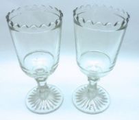 A pair of John Derbyshire Pressed Clear Glass Celery Vases, circa 1870, the bowls raised on