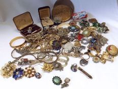 A large packet of assorted Costume Jewellery, including Bangles, Necklaces, Brooches, Rings etc