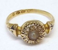 An early 20th Century hallmarked 18ct Gold Ring with Seed Pearl and small Diamond surround panel