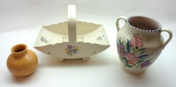A Mixed Lot of Poole Pottery items, to include a Table Basket decorated with floral sprigs on a