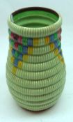 A Clarice Cliff Bizarre Ribbed Vase, produced by Wilkinsons Ltd, decorated with abstract design in