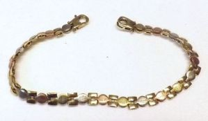 A Tri-colour yellow metal fancy link Bracelet, 19cm long, stamped “.375” and weighing approx 5 ½ gm