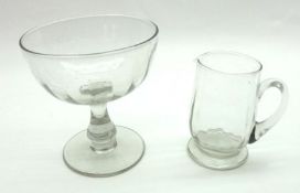 A 19th Century half-fluted goblet, short balustered stem and spreading circular foot; together