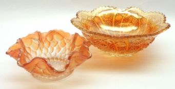 Two Carnival Glass Bowls, one of rosette form and the other with a serrated rim, 6” and 8” diameter