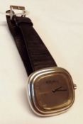 A 1990s Silver Cased Wristwatch “Roy King” with mechanical movement, black hands to a mirrored dial,