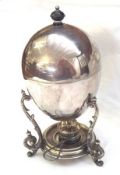 A late 19th/early 20th Century Egg Warmer of ovoid form with detachable lid (lacking internal
