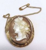 A Victorian Gold Framed Shell Cameo Brooch of a classical lady, engraved decoration to the surround,