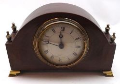 An Edwardian Mahogany Small Mantel Clock of arched form, case inlaid with hatched stringing and