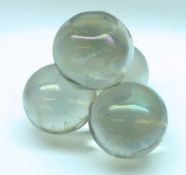 An unusual Doorstop formed as four Clear Glass Balls with lustre sheen, 6” high