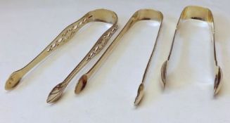 A Mixed Lot comprising: a pair of George II Sugar Tongs, Bright Cut Old English pattern with pierced