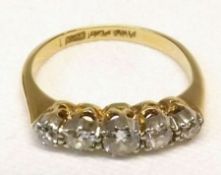 An 18ct Gold and Platinum five old cut Diamond Engagement Ring, the centre stone of approx.2 ct