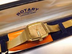 A Gents 1970s cased Rotary Gold plated Wristwatch, Gold batons to a brown metallic, shaped square