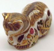 A Royal Crown Derby Paperweight “Cottage Garden Cat”, gilt button, 4 ½” long, boxed