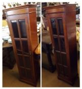 A pair of Narrow Mahogany Display Cabinets or Bookcases, with glazed bevelled eight-panelled