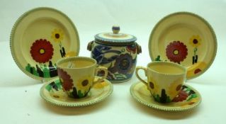 A Mixed Lot: a Poole Pottery Biscuit Barrel, typically decorated with bluebird and flowers; together