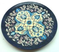 A late 19th Century Minton Wall Charger, decorated with abstract floral sprays in yellow, blue,