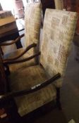 A pair of large 19th Century Armchairs, recently reupholstered, the arms carved with acanthus leaf