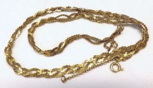 A hallmarked 18ct Gold Fancy “S” link triple strand Necklet, 40cm long and weighing approximately 13