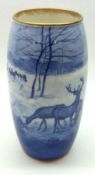 A Royal Doulton Vase, decorated with a blue and white scene of deer amongst snow, 6 ½” high (