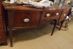 An early 19th Century Mahogany Bow Fronted Sideboard, satinwood strung and cross banded top over a