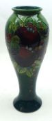 A Moorcroft Vase of tulip baluster form, decorated with a Finches design on a green ground, circa