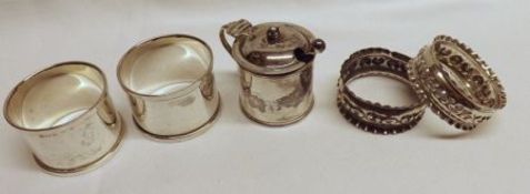 A Mixed Lot comprising: a pair of George V plain circular Napkin Rings, Birmingham 1931/2; a small
