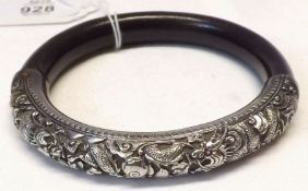 A Chinese Ebonised Wood and engraved white metal mounted Bangle (modern), 9cm diameter