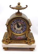 A decorative late 19th Century French Gilt Metal Mantel Clock, the circular painted dial with