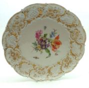 A 20th Century Meissen Circular Dish, the border moulded and gilded with foliage and the centre