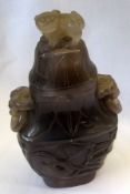 A Jadeite Large Covered Container of flask shape, the pull-off cover with a temple dog finial and