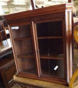 A small Oak Corner Cabinet with two glazed doors and shelved interior, 24” wide