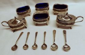 An Edward VII Six Piece Condiment Set in Georgian style, oval shaped with card cut rims, each