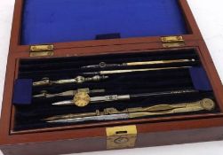 A Vintage Cased Geometry Set, the lid inscribed “Houghton-Butcher” and dated 1916