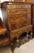 An 18th Century and later Walnut veneered Chest on Stand, the Chest with three short drawers and