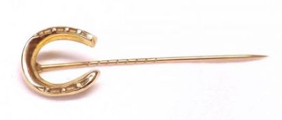 A late Victorian Cased hallmarked 9ct Gold Stick Pin with horseshoe finial (dented), hallmarked