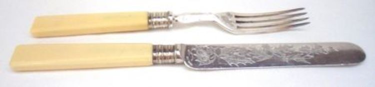 Six pairs of Victorian Fruit Knives and Forks with grapevine engraved blades and bone handles (12)
