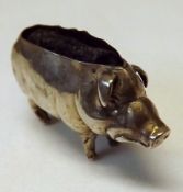 A Miniature Silver Encased Pin Cushion in the form of a pig, with distressed blue velvet inset, 2”