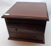 A small late 19th Century Mahogany Four Drawer Table Top Collectors Chest, the four graduated