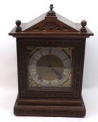 A late 19th/early 20th Century Oak Cased Mantel Clock, Winterhalder & Hofmeier, the square face with