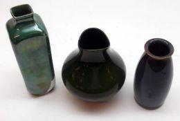 A group of three small Royal Doulton Vases; a Squat Green Flambé Vase; a Square Narrow Neck Vase